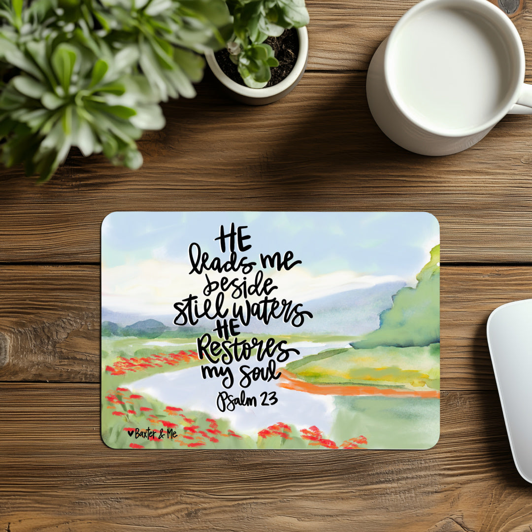 Decorative placemat with nature design and text on a wooden table with a cup of coffee.