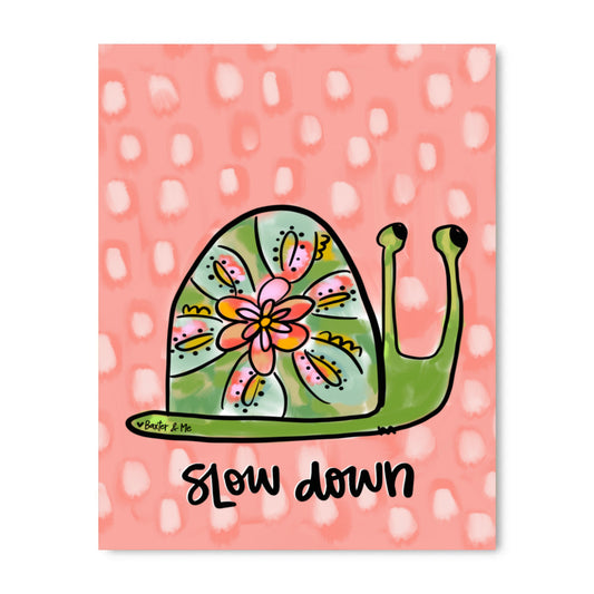 snail on peach background with words slow down