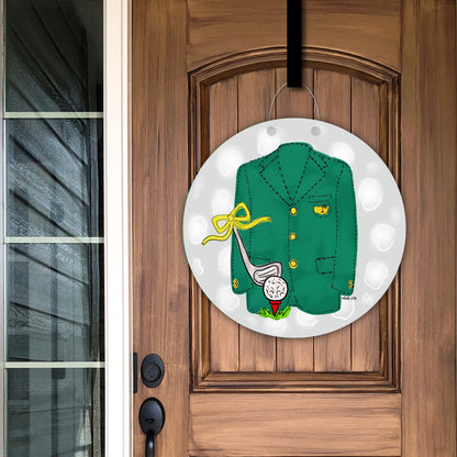 Decorative door hanger with a green jacket, golf club, and ball hanging on a wooden door.