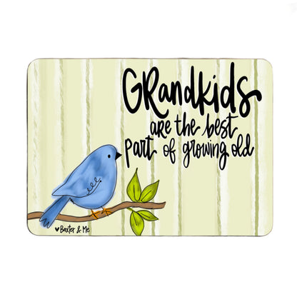 Decorative mouse pad with a blue bird illustration and text on a beige background