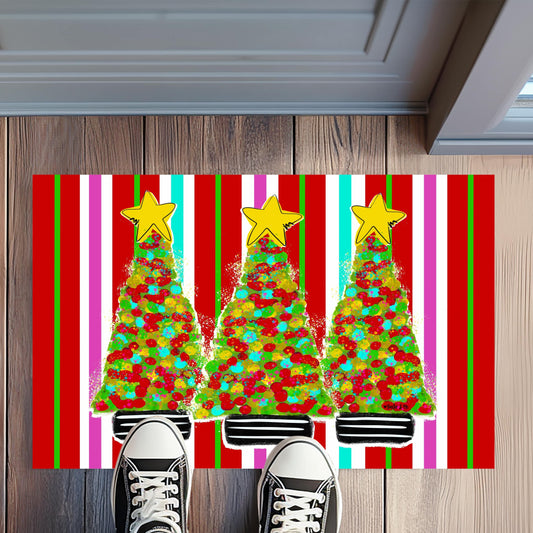 Colorful Christmas-themed doormat with trees and stars on a wooden floor.
