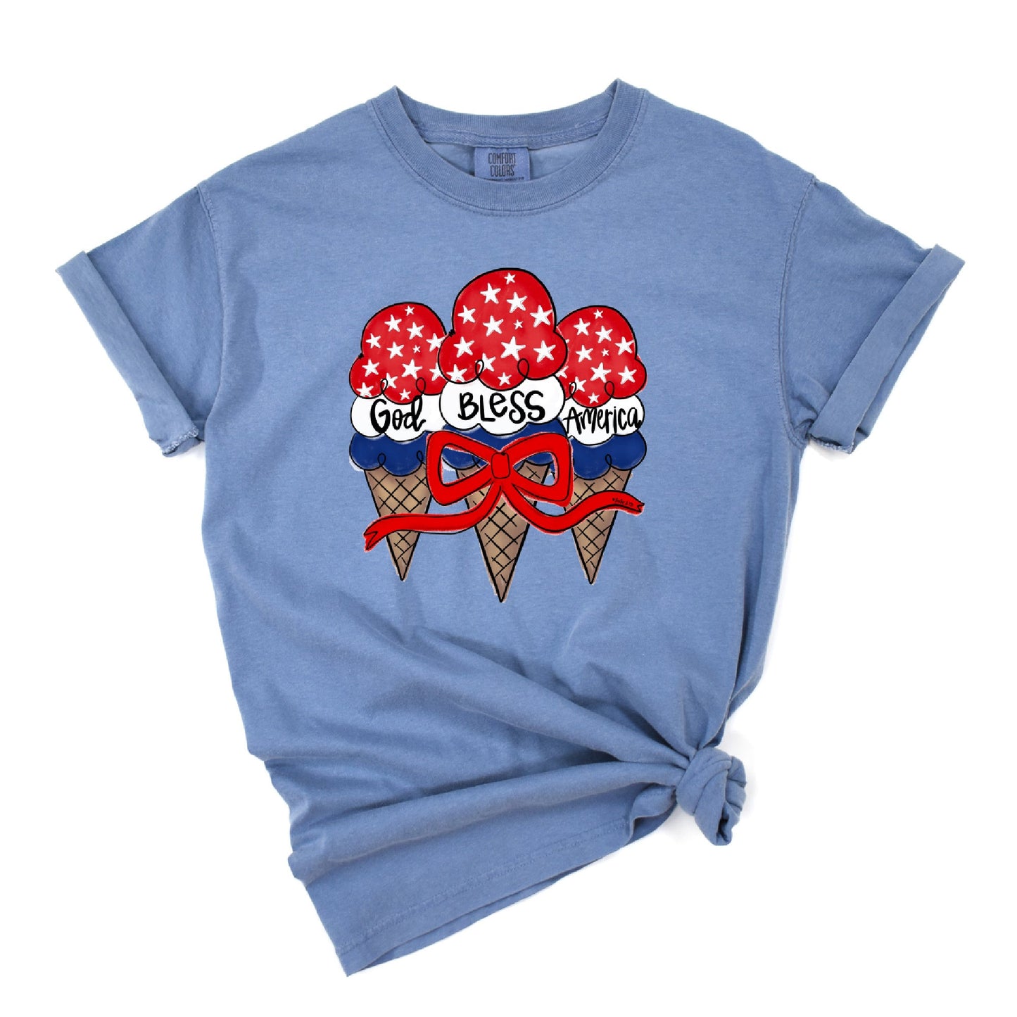 Blue t-shirt with ice cream cone graphic and 'God Bless America' text on a white background